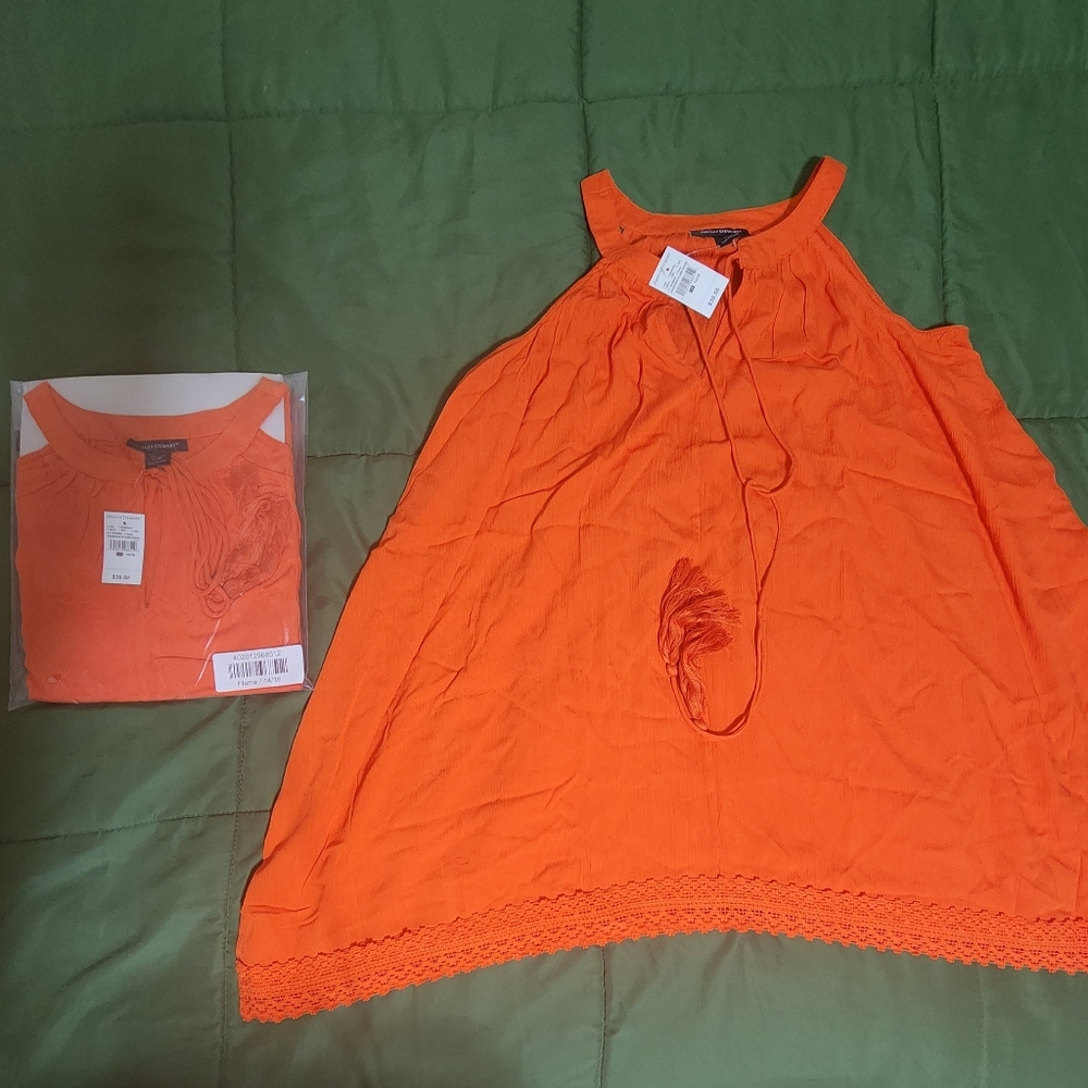 A beautiful vibrant orange top